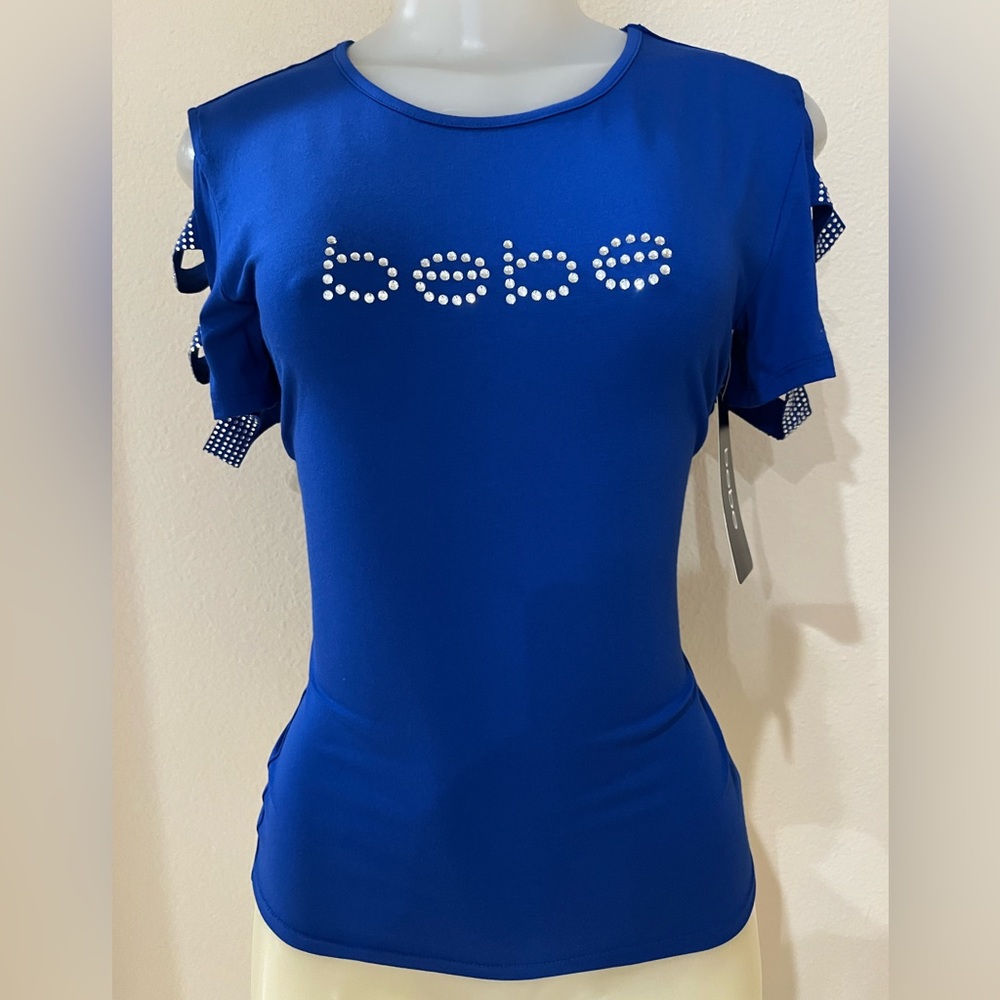 BEBE Surf the Web Logo Cut-our Jersey Tee. Shiny blue. New with tags
